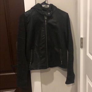 Cute faux leather jacket with sweater sleeves/hood